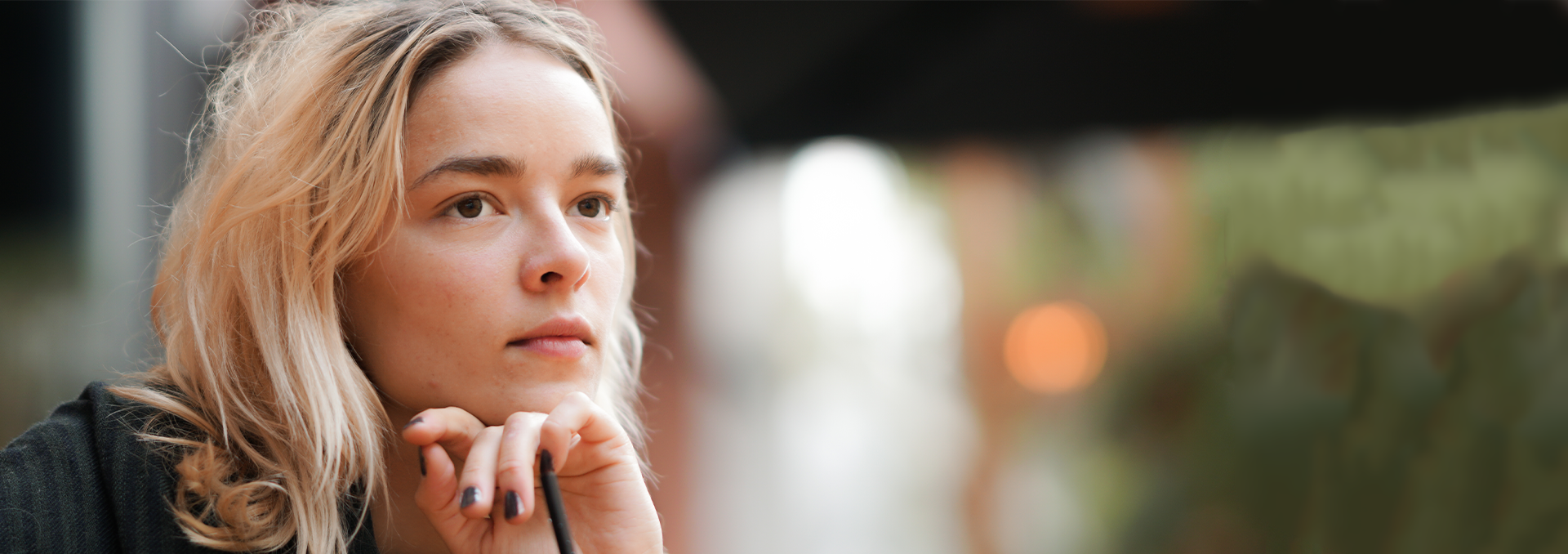 A young woman feeling emotional after an abortion